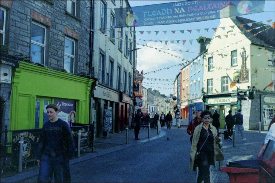 A Galway street under bunting and a Fleadh na Bealtaine festival banner